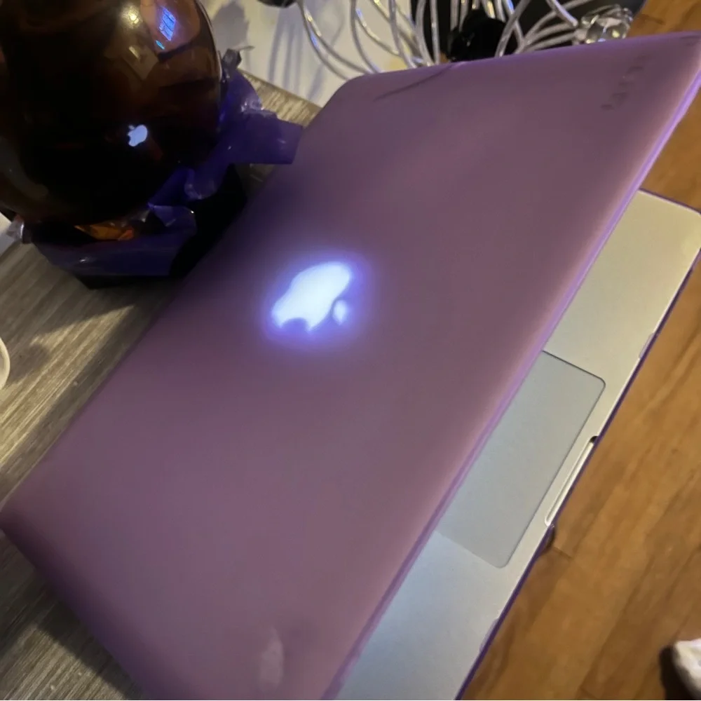 Apple MacBook with Silver Body and Black Keyboard